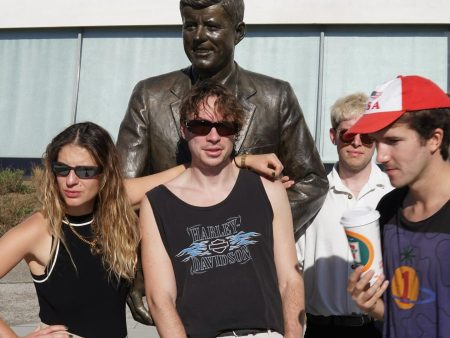 British rock band robbed at gunpoint during stop at Starbucks on first day of US tour.