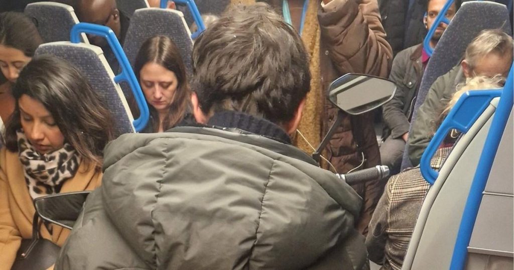 Individual Resembling “Joker” Character Observed on Motorbike Within Subway Car