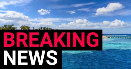 Fatal Shark Attack at Beach Resort Claims One Life, Injures Another