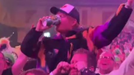 Ed Sheeran Responds to Ipswich Taunt at PDC World Darts Championship with Obscene Gesture.