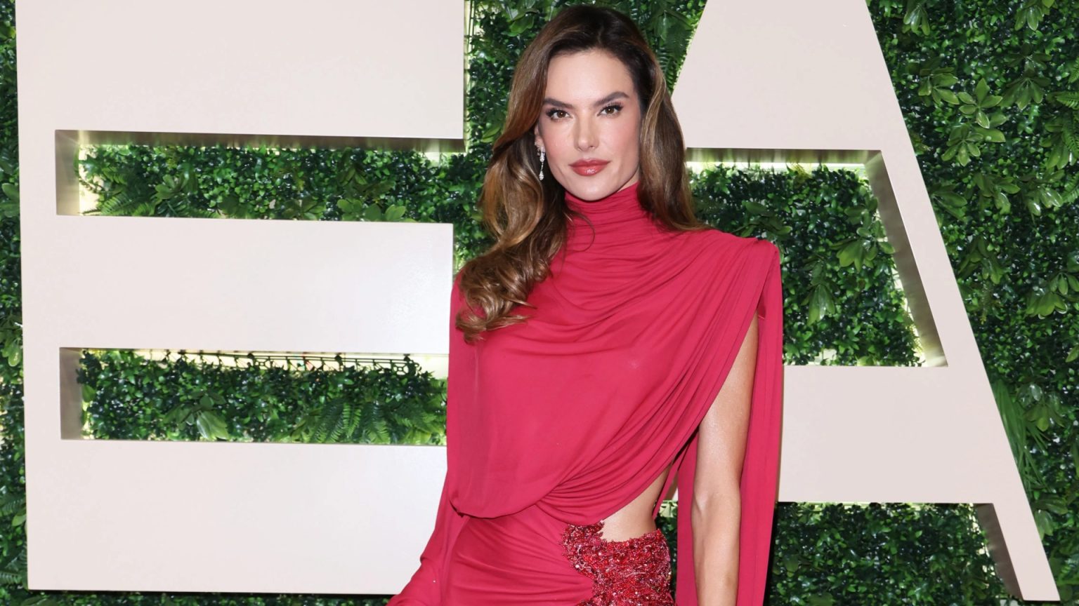 Alessandra Ambrosio Attends Saudi Arabian Film Festival in Striking Crimson Gown.