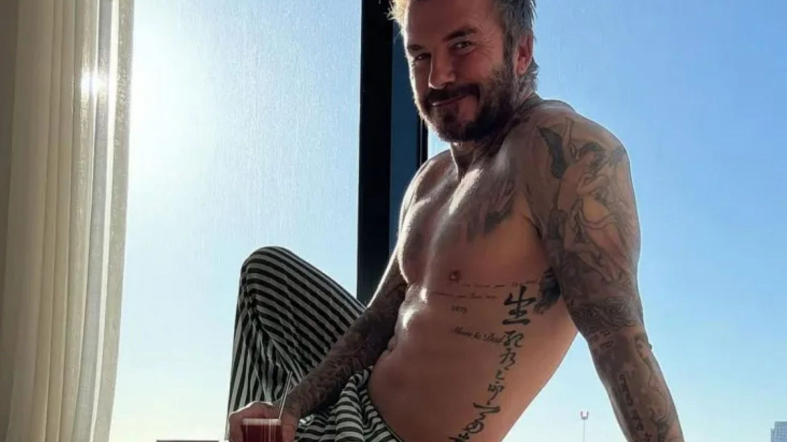 David Beckham Displays Physique in Recent Photograph