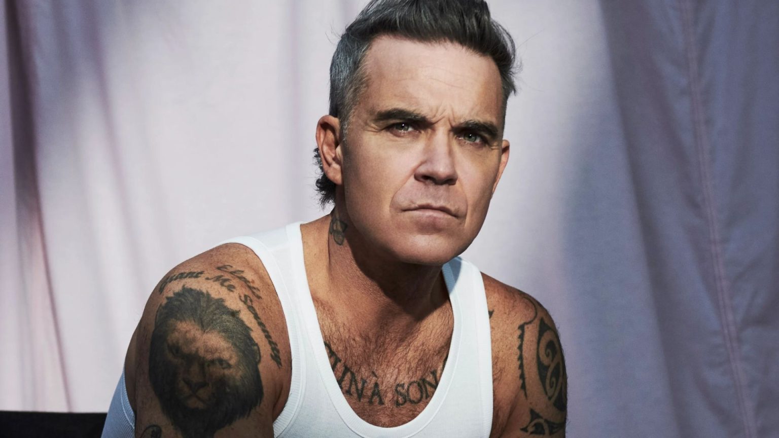 Robbie Williams Discusses Retaking GCSEs to Address Perceived Intellectual Insecurities.