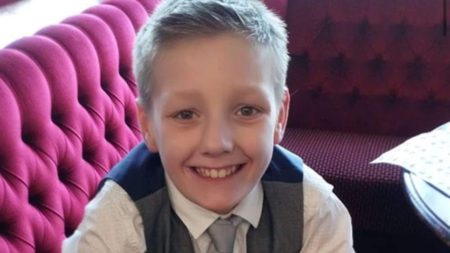 A Grieving Parent’s Christmas Tragedy: Placing Gifts in a Son’s Coffin.
