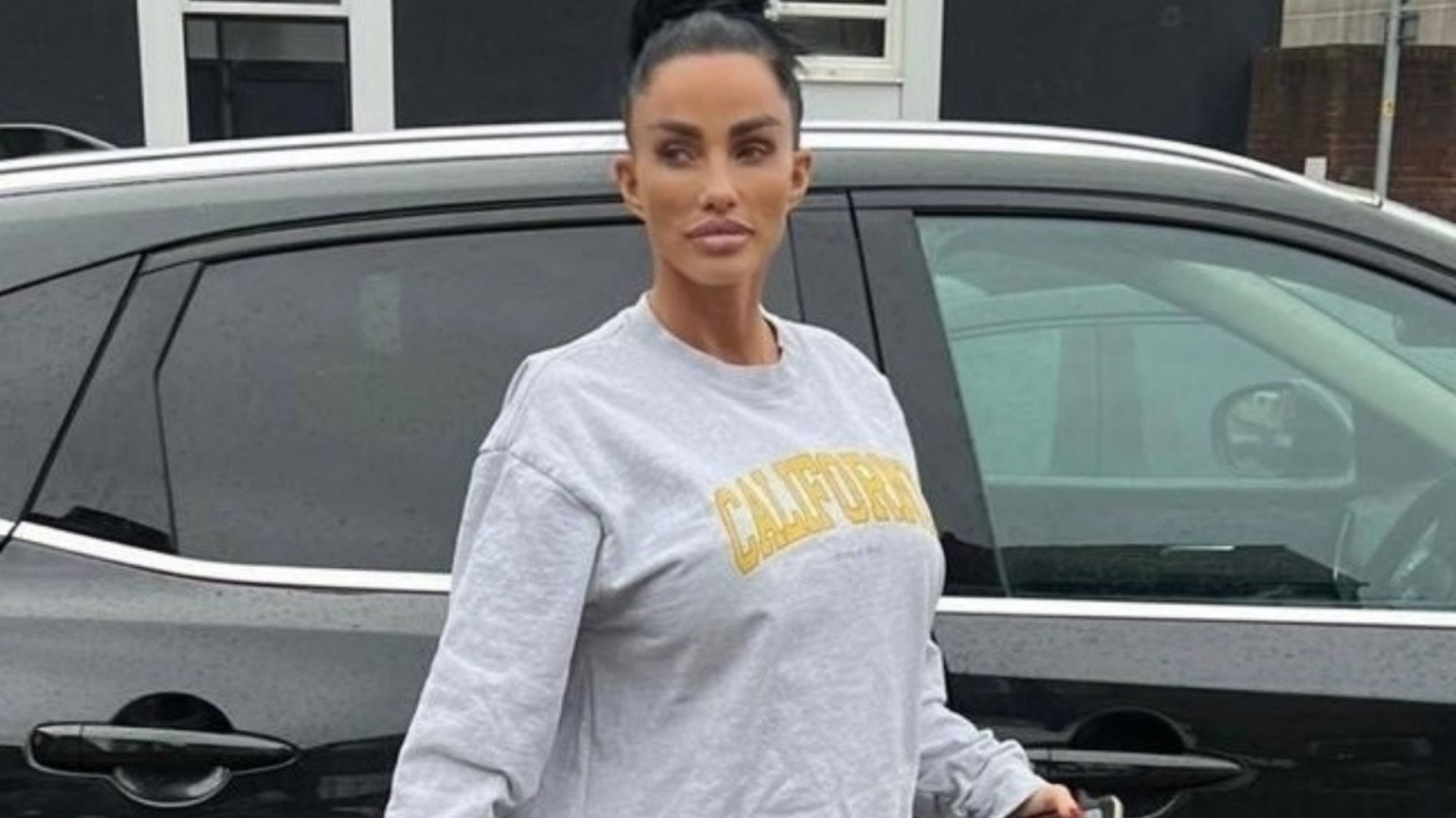 Katie Price Displays Post-Surgical Results During Solarium Visit.