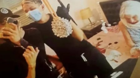 Teens Arrested After Photograph Surfaces of Elderly Woman Restrained and Robbed