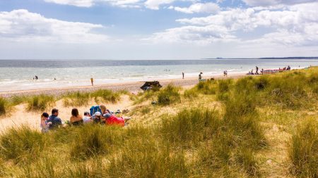 English seaside village home to one of the UK’s best beaches that is always quieter than its busy neighbour