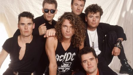 Former manager of rock band INXS wins bitter court fight to halt a major cash payout to ex-SAS husband