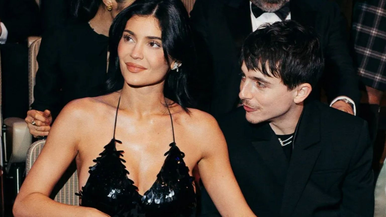 Kylie Jenner looks sensational in plunging black gown as she holds hands with boyfriend Timothee Chalamet at the BAFTAs