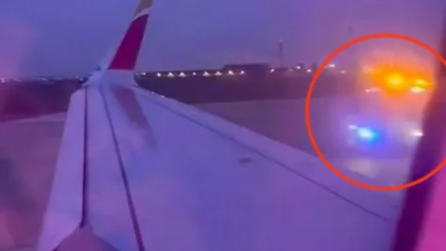 Plane passenger opens emergency exit and LEAPS OUT after attacking flight attendant in horror clash