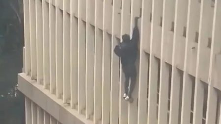 Shock moment thief escapes court by climbing out WINDOW and lowering himself down 3-storey building in bid for freedom