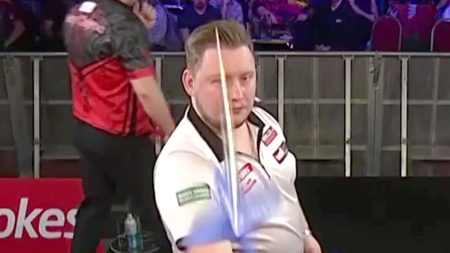 Martin Schindler forced to pull dart out of his foot as UK Darts Open board gets ‘violent’