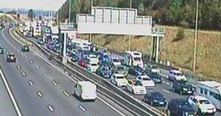 Major motorway grinds to a halt as Bank Holiday traffic chaos hits UK after woman dies in horror crash