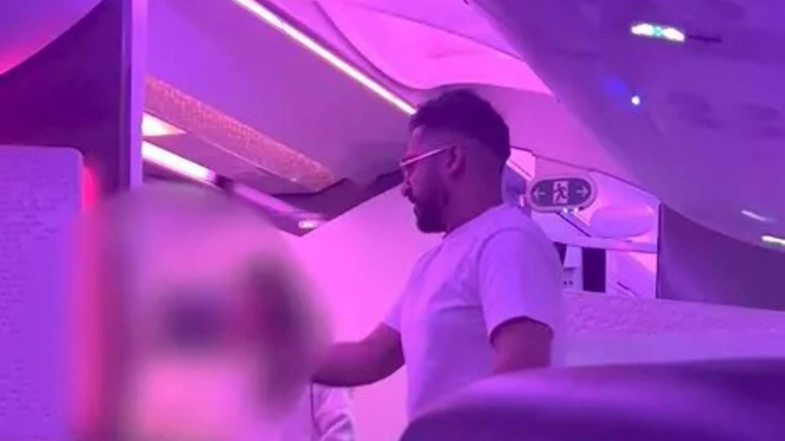 Moment Virgin Atlantic passenger hurls horrific abuse at hostess he threatened to ‘gang rape & set alight’ in vile rant