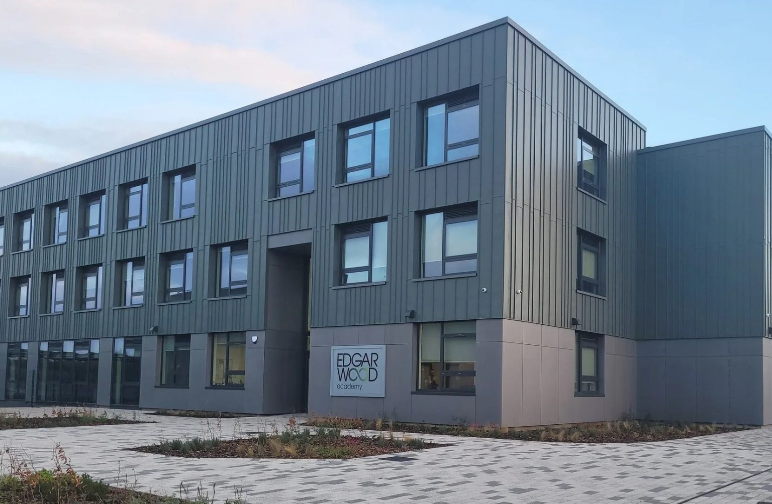 Man arrested after being spotted lurking outside school carrying hammer, hatchet and knife