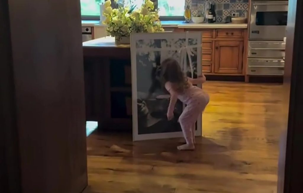 Meghan shares rare video of daughter Lilibet kissing surprise gift from Harry as she promotes ‘cringe-fest’ new show