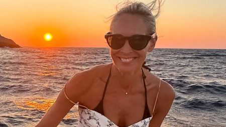 This Morning’s Jenni Falconer, 49, looks incredible in black bikini as she dives off a yacht with rarely seen family