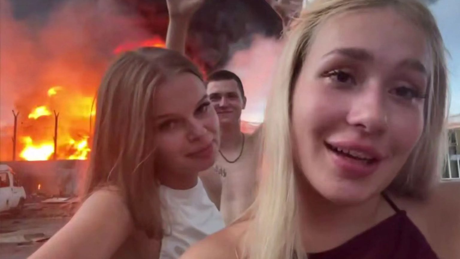 Influencers arrested after posting TikTok video posing in front of flaming Russian plant after Ukrainian strike