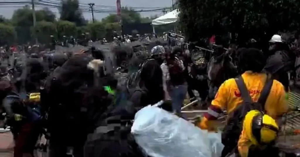 Riot police clash with protesters hurling stones outside World Cup opening ceremony