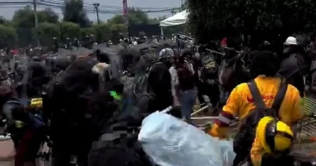Riot police clash with protesters hurling stones outside World Cup opening ceremony
