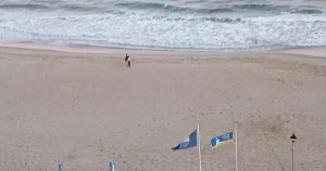 Mother ‘swimming with her son’ dies after being pulled from sea