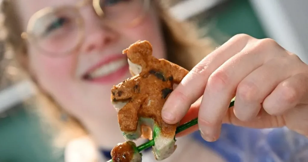 Bavarian sausage queen makes meat footballers for World Cup