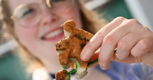 Bavarian sausage queen makes meat footballers for World Cup