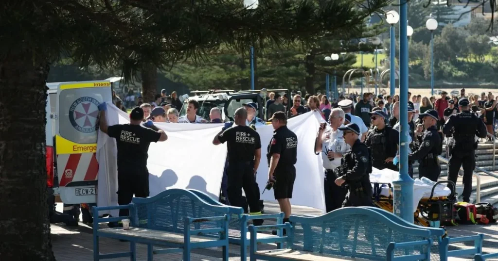Woman mauled by shark in front of families off popular beach