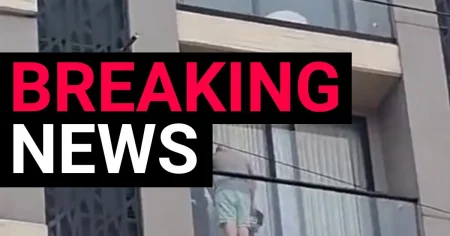 American ‘saving son from choking’ on balcony nearly lynched by peadohunting mob