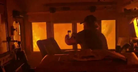 Terrifying footage shows the inside of a train being engulfed by a wildfire