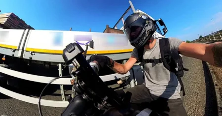 Motorcyclist narrowly avoids crash after lorry drives at them head-on