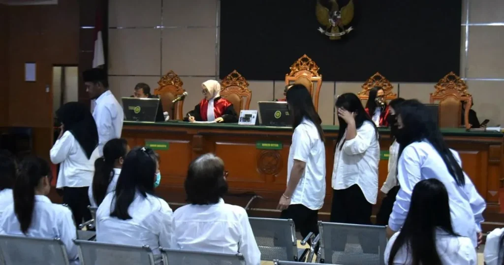 Nineteen members of child trafficking ring jailed over illegal adoptions