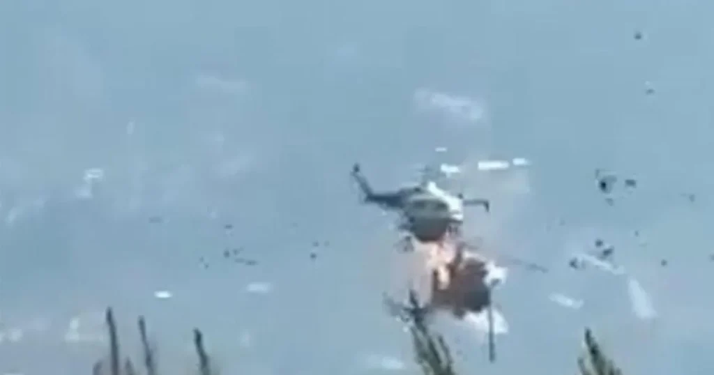 Helicopter bursts into flames after mid-air crash while fighting wildfire