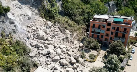Falling rocks smash cars after earthquake rocks major Italian city