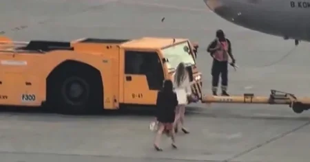 Two plane passengers ‘spotted running across tarmac to catch departing flight’