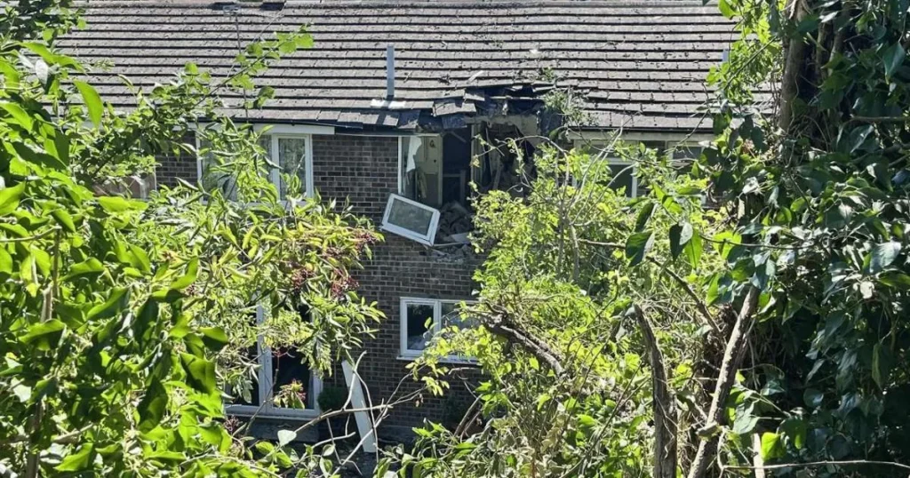 A car has somehow managed to crash into the top floor of a house in Kent