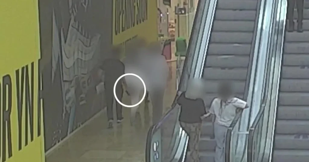 Mum confronts predator upskirting a young girl in shopping centre
