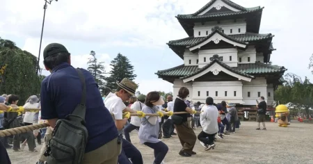 Hundreds pull giant castle for repairs in epic tug-of-war