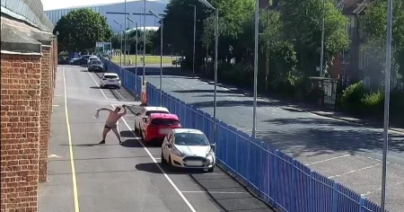 Half naked man tries to throw drugs over prison wall but fails three times