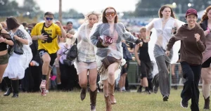 UK’s biggest festivals battered by rain and storms – and there’s more to come