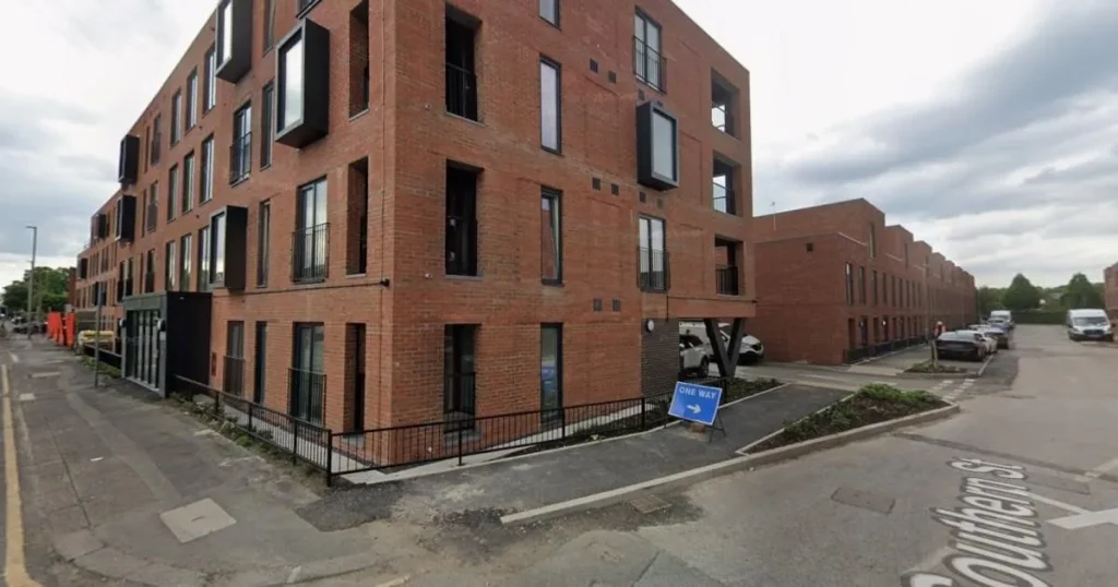 Man fighting for life after falling from balcony as police make arrest