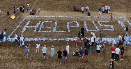 Village spells out ‘help us’ using bottles after enduring a week with no water