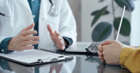 Doctor breached data rules in phone call during patient exam