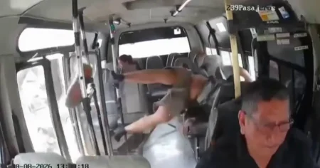 Biker crashes into bus and ends up accidentally boarding it