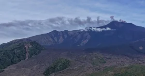 Ash billows two and a half miles into sky and ‘red alert’ issued after Mount Etna erupts
