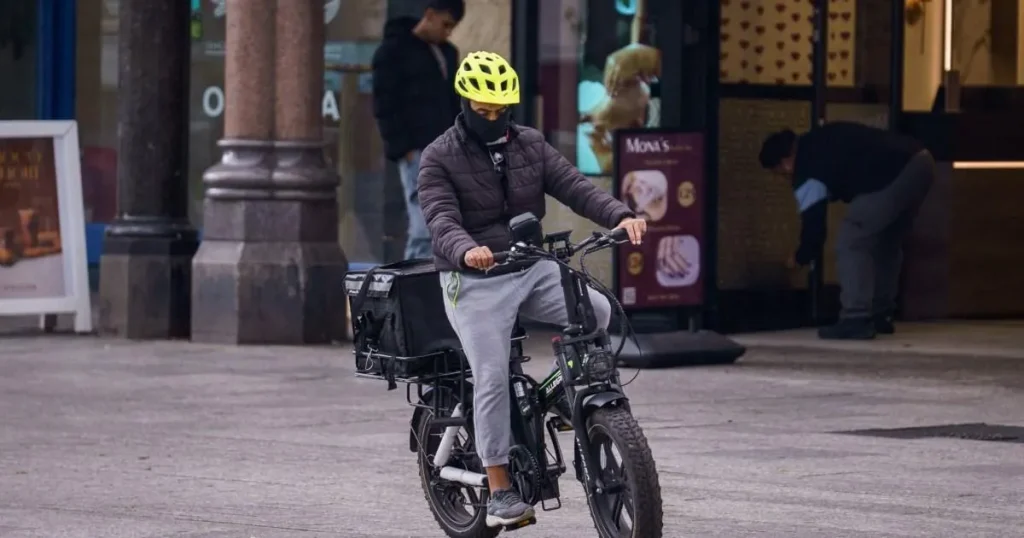 Masked men in Nottingham defy face covering ban by taking to streets