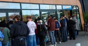 Why are hundreds of people queuing for Pokémon cards today?