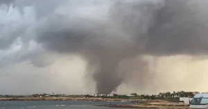 Devastating waterspout tears through Sicily overturning cars and damaging school