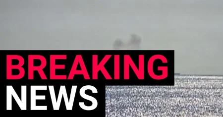 ‘Drone’ hits cargo ship in the Black Sea leaving more than a dozen missing