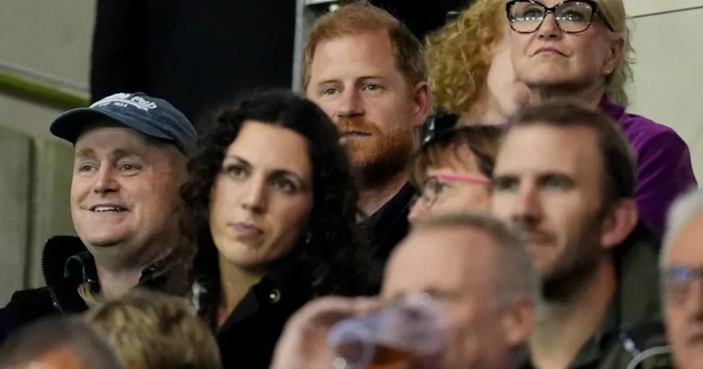Prince Harry booed by fans during surprise appearance in the stands at rugby match